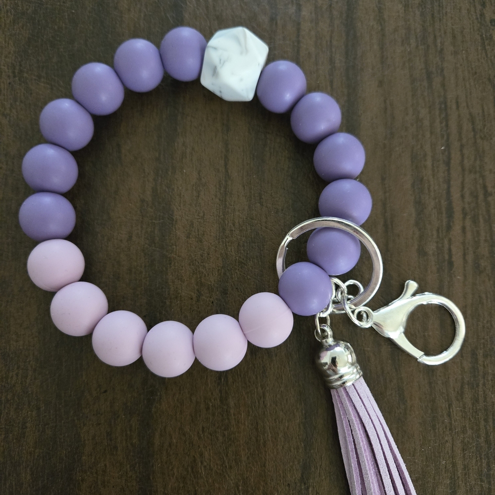 Purple Beaded Key Chain Wristlet Bracelet with Tassel. New! Never used.